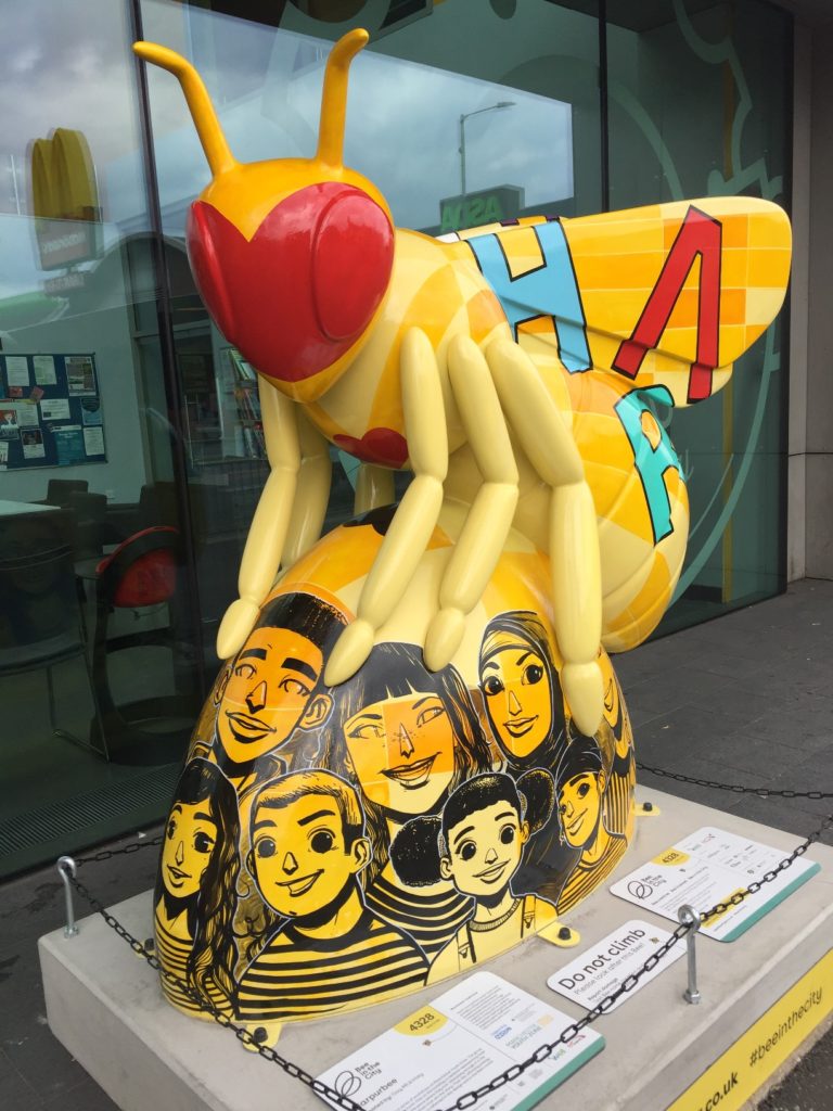 Harpurbee - the Bee in the City sculpture outside Manchester Youth Zone